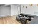 Functional mud room with custom bench seating, ample storage, and adjacent laundry hookups at 8333 Depew Way, Arvada, CO 80003