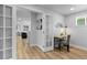 Bright home office with a view of the living room through stylish french doors at 8333 Depew Way, Arvada, CO 80003