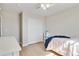 This bedroom has a ceiling fan, hardwood floors, a sliding door closet and is well-lit from the window at 27798 E 7Th Pl, Aurora, CO 80018