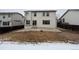 Large backyard with a concrete patio and grass at 20558 E Grand Ln, Aurora, CO 80015