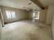 Large unfinished basement with multiple windows provides abundant natural light and ventilation at 20558 E Grand Ln, Aurora, CO 80015