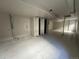 Unfinished basement features utility connections, offering potential for laundry or utility area at 20558 E Grand Ln, Aurora, CO 80015
