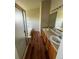 Bathroom featuring double sinks, wood cabinets, and a separate tub at 20558 E Grand Ln, Aurora, CO 80015