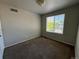 Neutral colored bedroom with carpeted floor, window for natural light, and ample room for furniture at 20558 E Grand Ln, Aurora, CO 80015