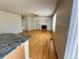 Bright and open living space featuring a fireplace, hardwood floors and natural light at 20558 E Grand Ln, Aurora, CO 80015