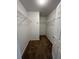 Spacious walk-in closet with shelving and brown carpeting provides ample storage space at 20558 E Grand Ln, Aurora, CO 80015