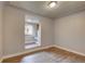 Bedroom with hardwood floors and attached room at 4514 Bryant St, Denver, CO 80211