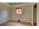Bedroom featuring hardwood flooring and a window for natural light at 4514 Bryant St, Denver, CO 80211