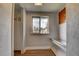 Mud room with window and built-in bench at 4514 Bryant St, Denver, CO 80211