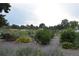 This community garden features an array of raised beds, providing space for various plants and gardening activities at 2684 S Logan St, Denver, CO 80210