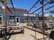Exterior view of Denver Beer Co featuring a patio with many picnic style tables for patrons at 2684 S Logan St, Denver, CO 80210