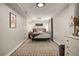 Spacious bedroom with hardwood floors, cozy decor, and ample natural light at 7256 S Broadway, Centennial, CO 80122