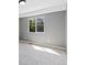 The bedroom includes carpet, a window, and neutral-color walls at 139 N Prairie Falcon Pkwy, Brighton, CO 80601