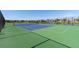A view of the neighborhood tennis court, perfect for recreation and exercise at 139 N Prairie Falcon Pkwy, Brighton, CO 80601