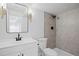 Modern bathroom features a shower, toilet, and vanity with lighting at 22935 E River Chase Way, Parker, CO 80138
