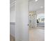 Bright hallway leads to the primary bathroom and the main bedroom at 22935 E River Chase Way, Parker, CO 80138
