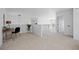 Spacious loft area with neutral carpet, white railings, and modern lighting at 22935 E River Chase Way, Parker, CO 80138