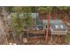 Secluded home with a large deck and ample tree coverage at 7510 Blue Creek Rd, Evergreen, CO 80439