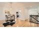 Dining area and eat-in kitchen with modern finishes and stainless steel appliances at 7452 W Cedar Cir, Lakewood, CO 80226