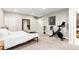 This bedroom includes plush carpet, a full sized bed, and a large closet at 6764 Osage St, Denver, CO 80221