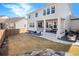 Expansive backyard with a covered patio, perfect for outdoor entertaining and relaxation at 16195 Red Bud Loop, Parker, CO 80134