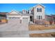 Charming two-story home featuring a three-car garage and well-maintained landscaping at 16195 Red Bud Loop, Parker, CO 80134