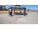 Park pavilion with picnic tables and a grill, providing a shaded area for community gatherings at 16195 Red Bud Loop, Parker, CO 80134