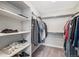 Walk-in closet with built-in shelving and ample hanging space at 16195 Red Bud Loop, Parker, CO 80134