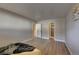 Spacious bedroom with wood floors and convenient access to the closet at 7755 E Quincy Ave # 104A1, Denver, CO 80237