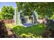 An inviting backyard features a deck, garden beds and privacy fence at 4129 Amber St, Boulder, CO 80304