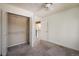 A bright bedroom features neutral walls, carpet and closet with metal shelving at 4129 Amber St, Boulder, CO 80304