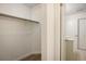 Walk-in closet with shelving, and nearby bathroom at 4129 Amber St, Boulder, CO 80304