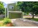 Home featuring an attached garage and well-manicured landscaping at 4129 Amber St, Boulder, CO 80304