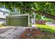 Charming home featuring an attached garage, verdant lawn, and inviting front entrance at 4129 Amber St, Boulder, CO 80304