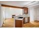 Kitchen featuring hardwood floors and stainless steel appliances at 4129 Amber St, Boulder, CO 80304