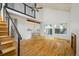 Bright living room featuring hardwood floors, stairs, and a modern aesthetic at 4129 Amber St, Boulder, CO 80304