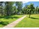 The park features a playground, walking path, and grassy area for recreation at 4129 Amber St, Boulder, CO 80304