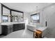 Bright bathroom with a large tub, walk-in shower, double vanity, and view from the window at 46692 Silver Fir St, Parker, CO 80138