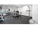 Home gym with modern exercise equipment and mirrored wall at 46692 Silver Fir St, Parker, CO 80138