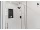 Modern tiled shower with glass door and convenient built-in niche for toiletries at 6488 S Heritage E Pl, Centennial, CO 80111