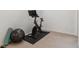Functional workout space with an exercise bike, yoga mat, and fitness ball at 6488 S Heritage E Pl, Centennial, CO 80111