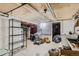 Basement featuring concrete floor, white washer and dryer, and a utility sink at 2303-2305 W 32Nd Ave, Denver, CO 80211
