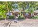 Charming brick home with landscaped front yard, and a welcoming entrance at 2303-2305 W 32Nd Ave, Denver, CO 80211