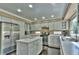 Bright, updated kitchen featuring stainless steel appliances, a center island, and ample cabinet space at 10272 Fawnbrook Ct, Highlands Ranch, CO 80130