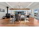 Dining room features a modern wood burning stove, wood dining table and an open floor plan at 7065 E Caley Ave, Centennial, CO 80111