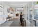 Elegant hallway featuring abundant natural light, contemporary finishes, and seamless transitions to the home's living spaces at 7065 E Caley Ave, Centennial, CO 80111