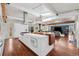 Open-concept kitchen features stainless steel appliances and seamlessly connects to the living area at 7065 E Caley Ave, Centennial, CO 80111