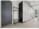 Functional mud room area featuring practical storage and seating solutions with natural light at 7065 E Caley Ave, Centennial, CO 80111