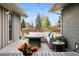 Outdoor patio featuring comfortable seating under string lights with an outdoor fireplace at 7065 E Caley Ave, Centennial, CO 80111