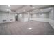 Large basement features neutral carpet, white walls and recessed lighting at 5404 W Rowland Pl, Littleton, CO 80128